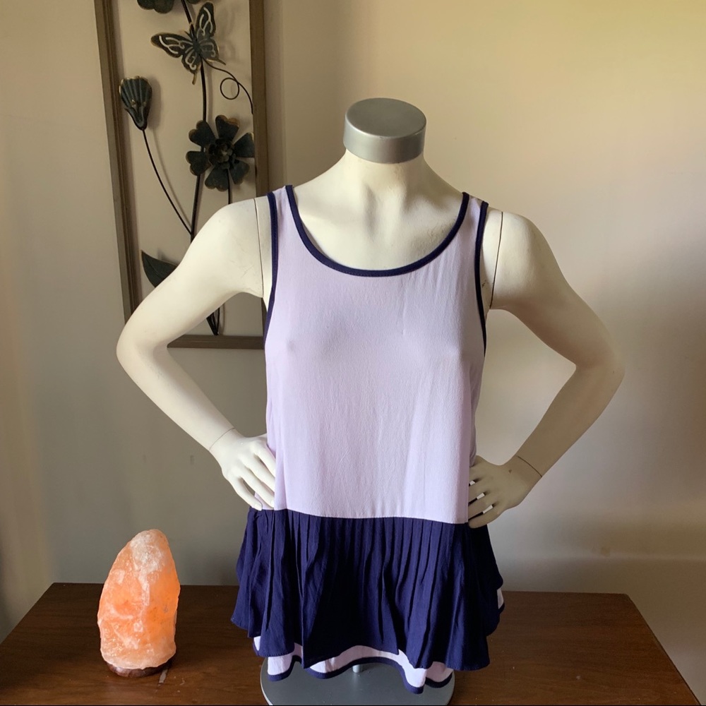 Sleeveless top with ruffled bottom